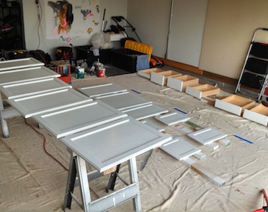 Cabinet doors being painted